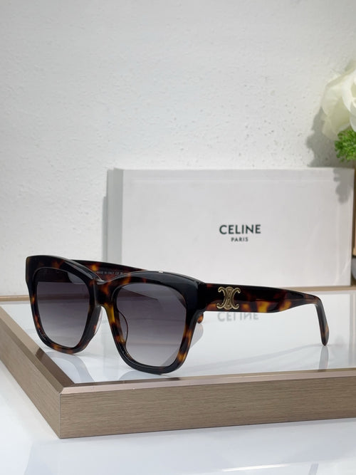 Tortoiseshell sunglasses with square cat-eye frames and dark tinted lenses