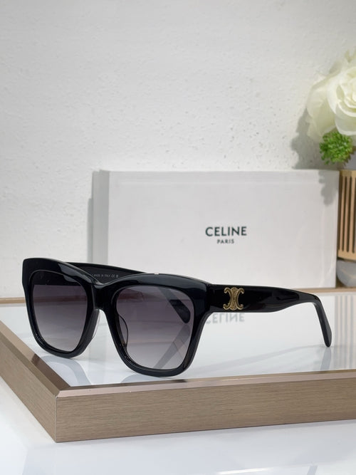 Black cat-eye sunglasses with thick frames and dark tinted lenses