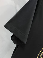 Versace black T-shirt sleeve and hem detail
