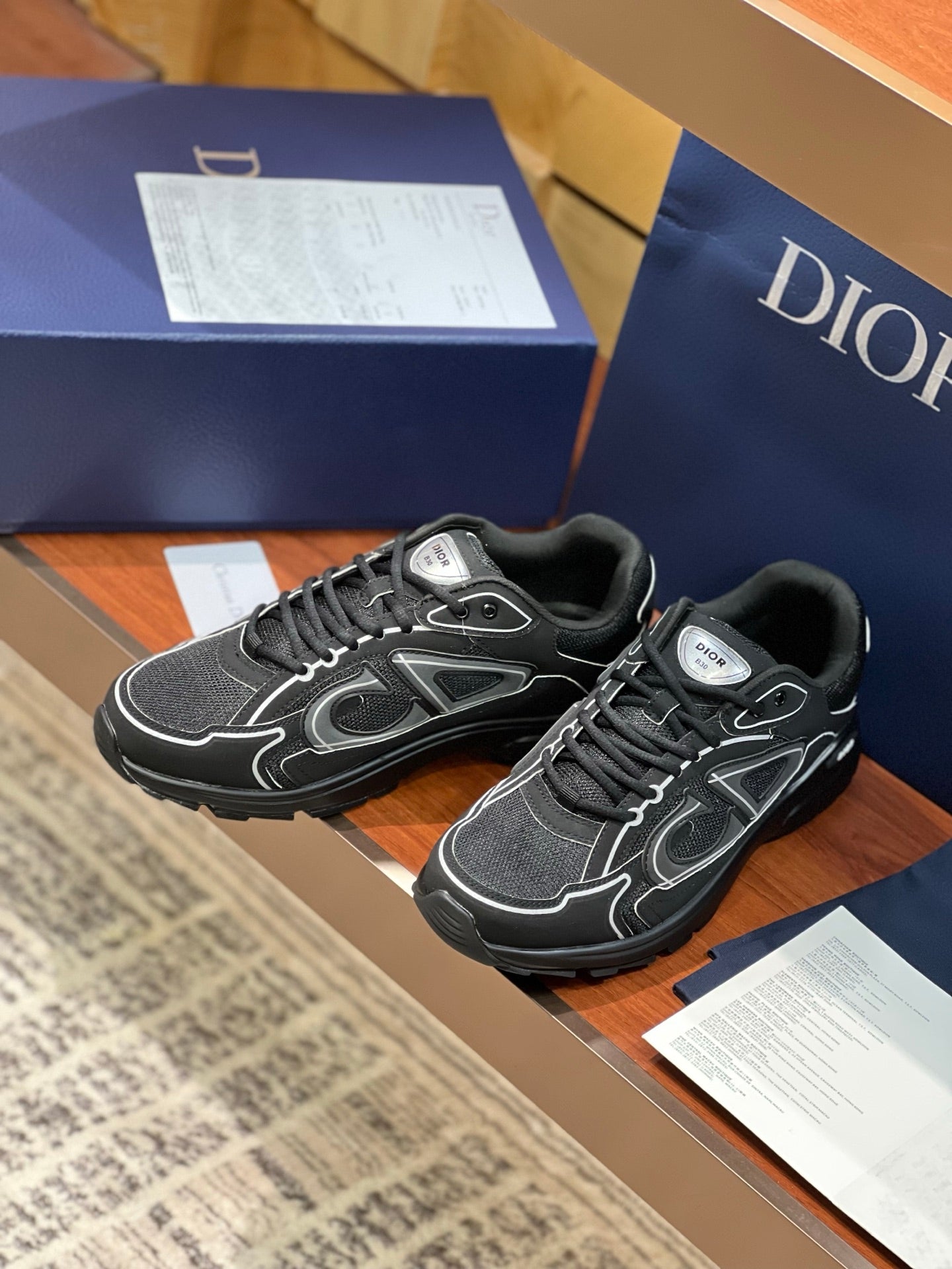 Dior ladies lace-up sneakers, dark gray with white detailing and black laces