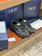 Dior ladies lace-up sneakers: dark gray with white logos and thick tread sole