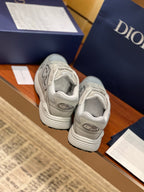 Dior ladies sneakers heel view, light gray with padded collar and chunky sole