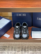 Black and gray lace-up sneakers with chunky sole and Dior logo patch on tongue