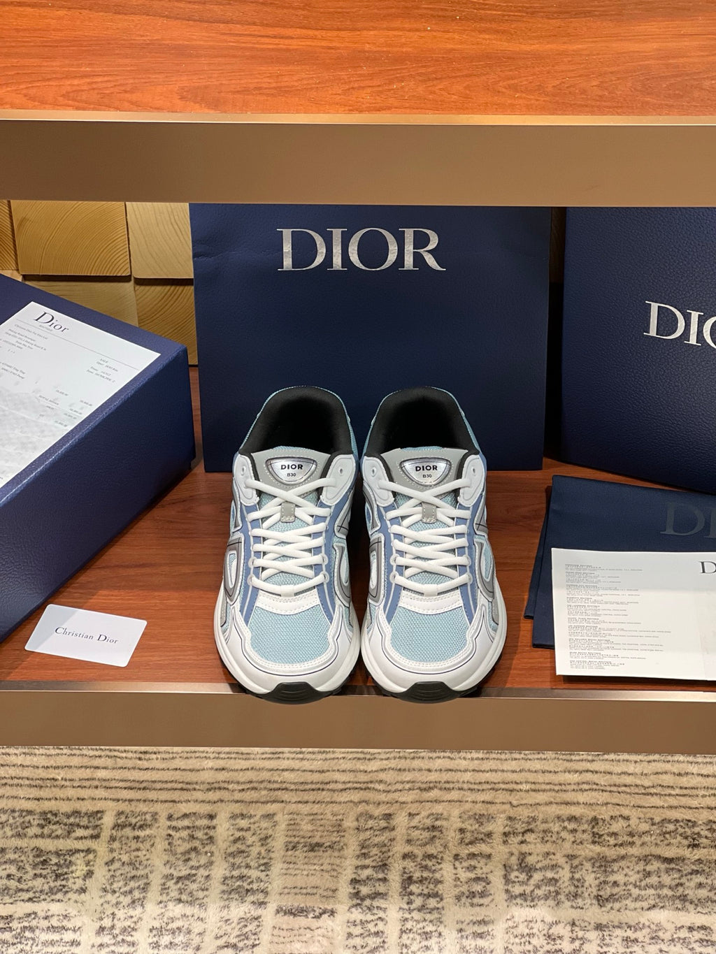 Dior women's lace-up sneakers in light blue and white, round toe, chunky sole