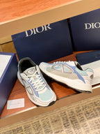 Dior women's lace-up sneakers, light blue and white with logo details on side