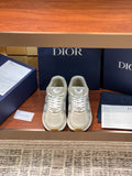 Beige Dior women's lace-up sneakers with metallic logo on side