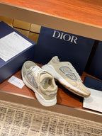 Beige Dior lace-up sneakers with large side emblem and white stripes