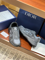 Dior ladies grey lace-up sneakers pair with textured outsole