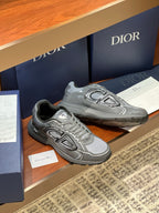 Dior ladies grey lace-up sneakers with embossed emblem on the side