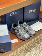 Dior ladies grey lace-up sneakers, side profile with logo detail