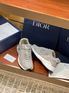 Dior women's beige lace-up sneakers, three-quarter view