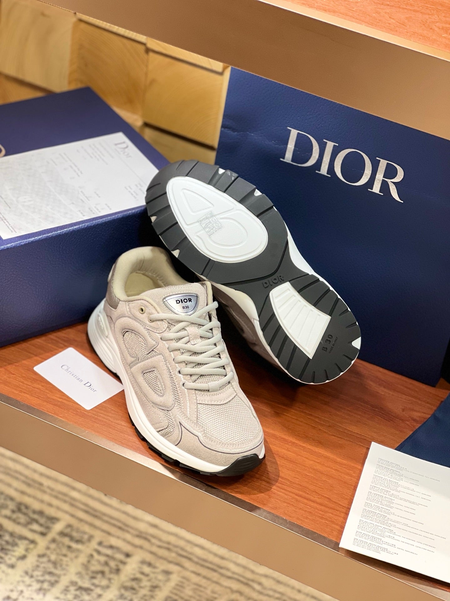 Dior women's beige lace-up sneakers with visible tread outsole