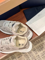Dior women's beige lace-up sneakers, close-up of laces and side logo