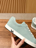 Hermes unisex light blue suede sneaker with side H logo, white sole and laces