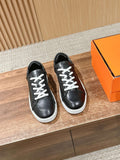 Hermes unisex black leather lace-up sneakers with white laces and white rubber soles