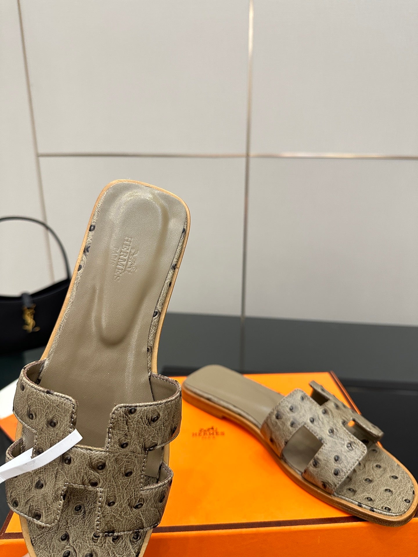 Hermes womens mule sandals in light gray suede with perforated straps and beige lining