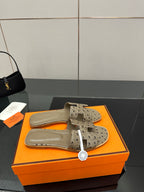 Hermes womens slide sandals, light gray perforated suede with tan insole and wide strap