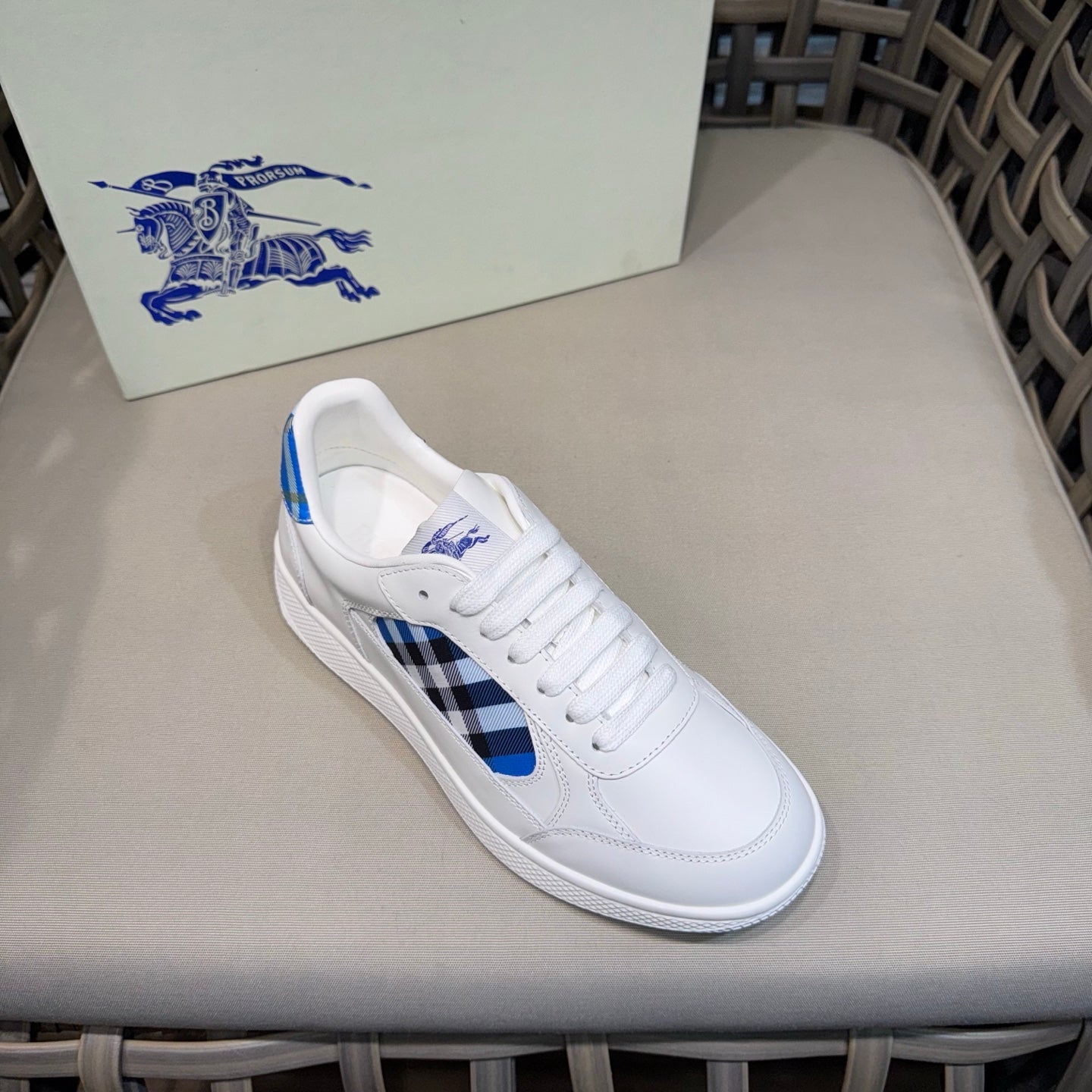 Burberry white low-top sneakers with blue check swoosh-style stripe