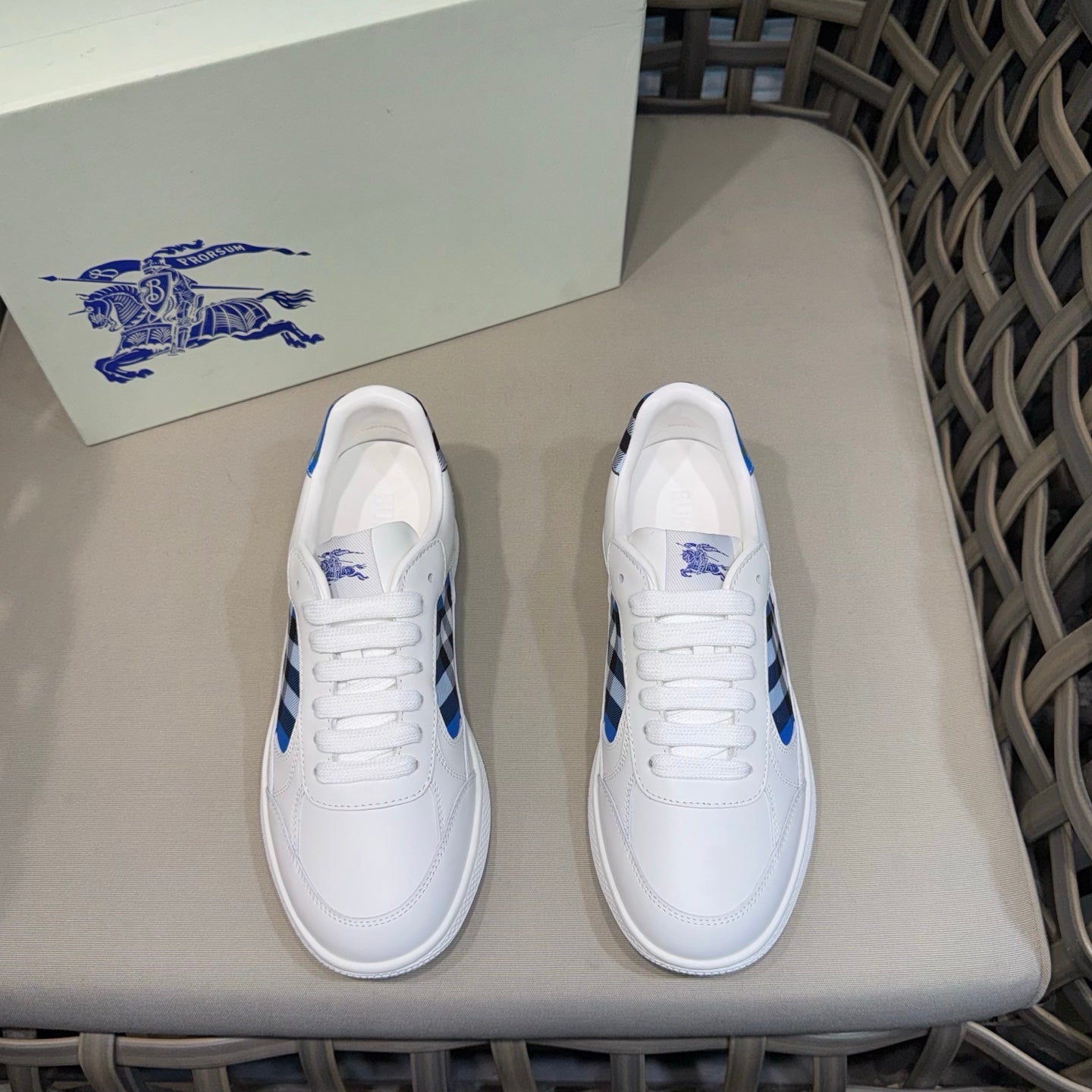 Burberry white sneakers with blue check side panel and lace-up design