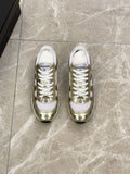 Unisex sneakers with white mesh, gold toe caps, logo print, white laces