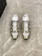 Unisex sneakers with white mesh, gold toe caps, logo print, white laces