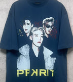 Blue graphic T-shirt close-up with three portraits and PPXPRIT text
