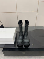 Balenciaga women's black mid-calf boots with side ankle strap and chunky outsole