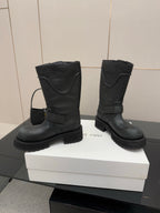 Balenciaga women's black mid-calf boots with folded straps and buckle details