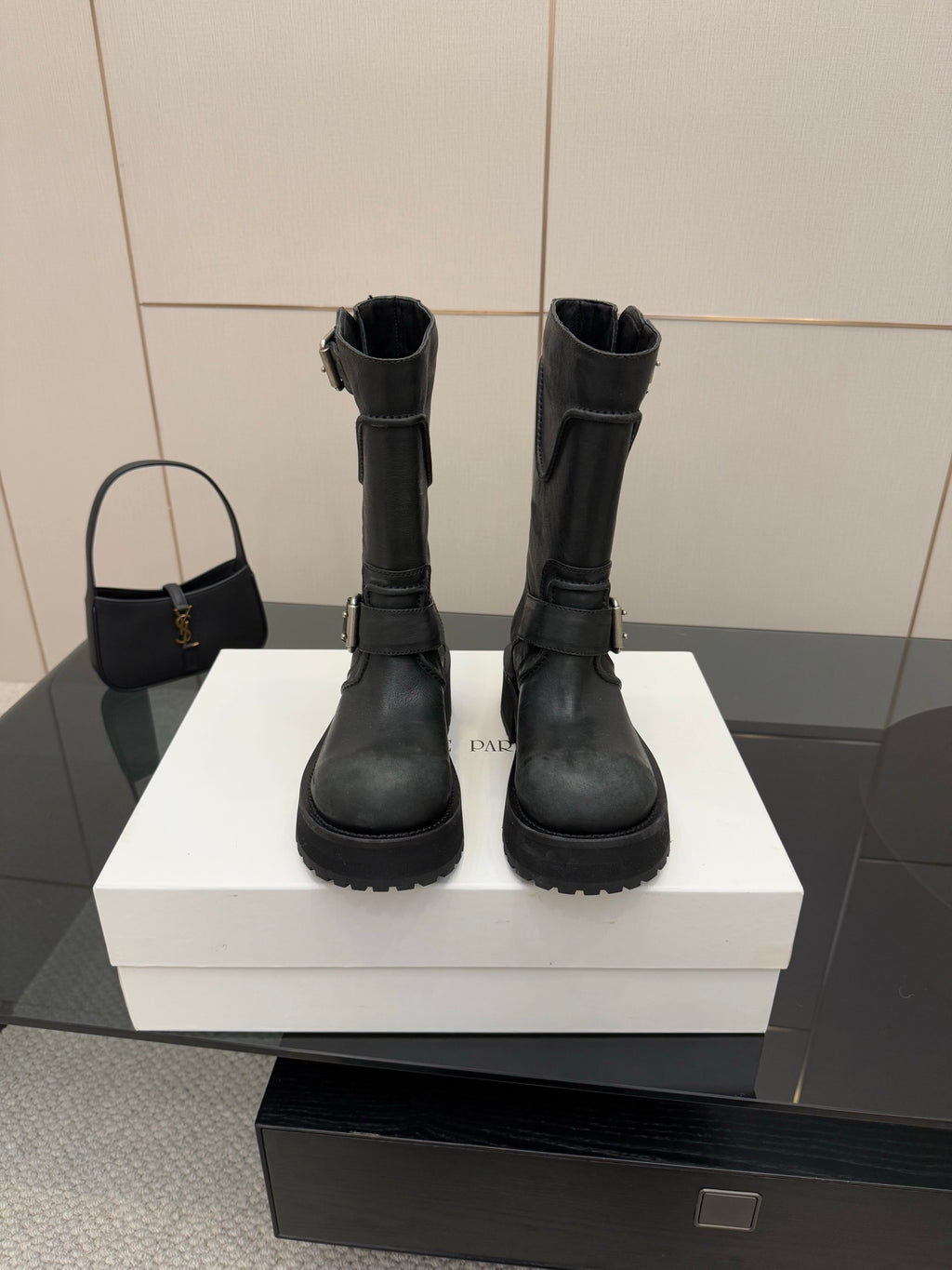 Balenciaga women's black mid-calf boots with strap buckles and chunky rubber sole