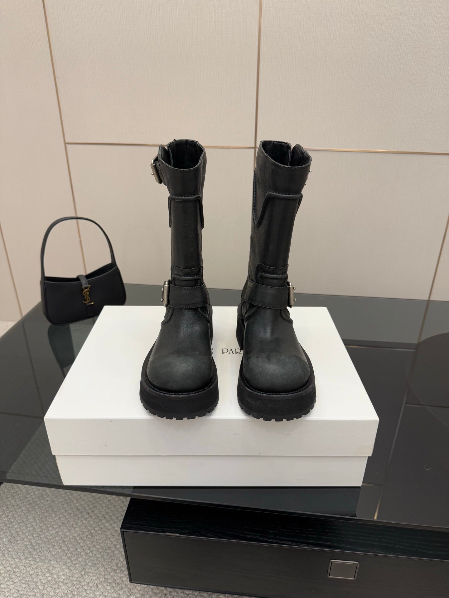 Balenciaga women's black mid-calf boots with strap buckles and chunky rubber sole