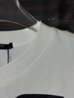 White crewneck T-shirt with ribbed collar and partial face graphic