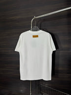 White crewneck T-shirt on hanger with small neck label on back