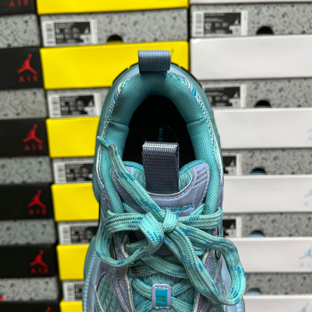 Teal athletic sneaker heel and lace-up collar with padded lining