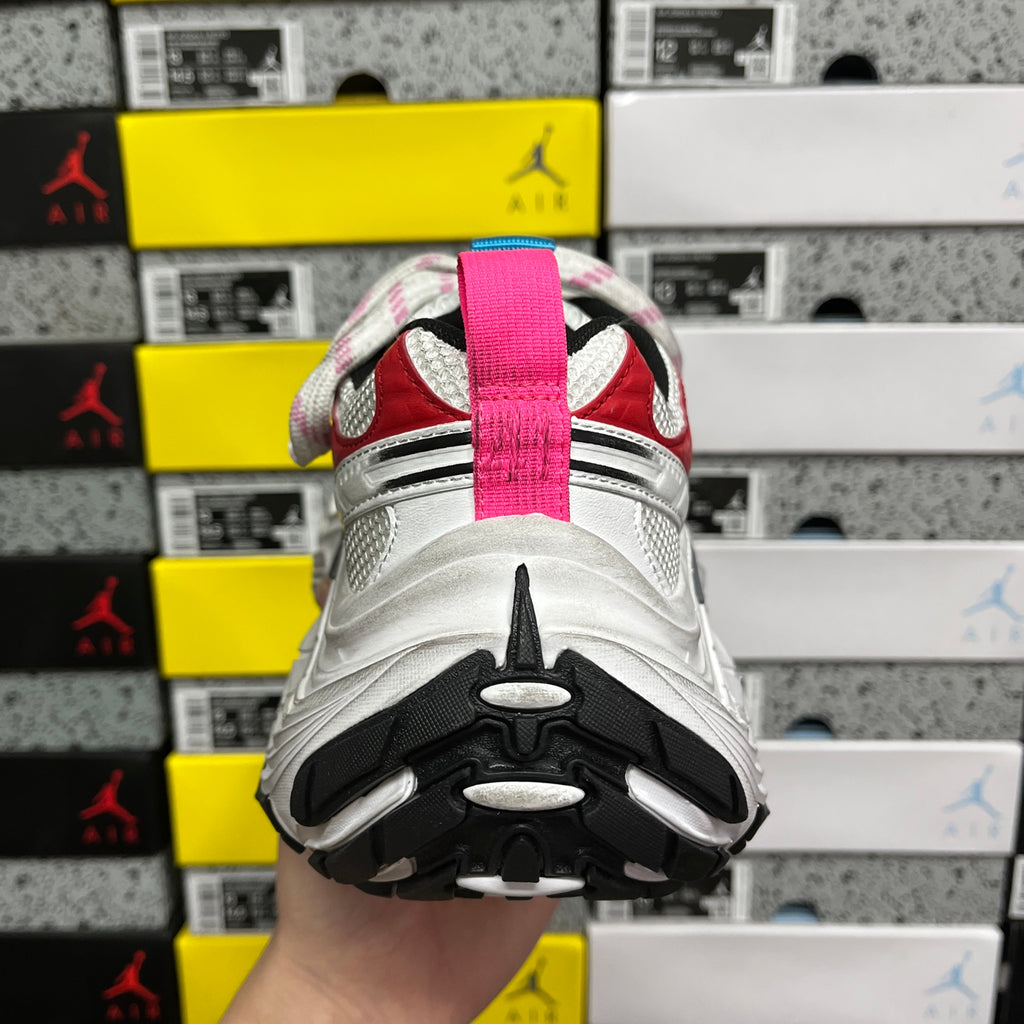 Balenciaga unisex sneakers, heel view with pink strap and black tread sole