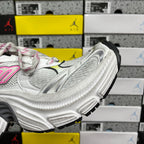 Balenciaga unisex sneakers, side view in white with multicolor accents and black outsole