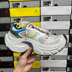 Balenciaga unisex sneakers, white upper with blue and yellow accents, chunky sole