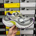 Multicolor sporty sneakers with gray mesh, purple accents, and neon lime details