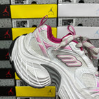 White lace-up sneaker with pink collar, braided laces, and side logo
