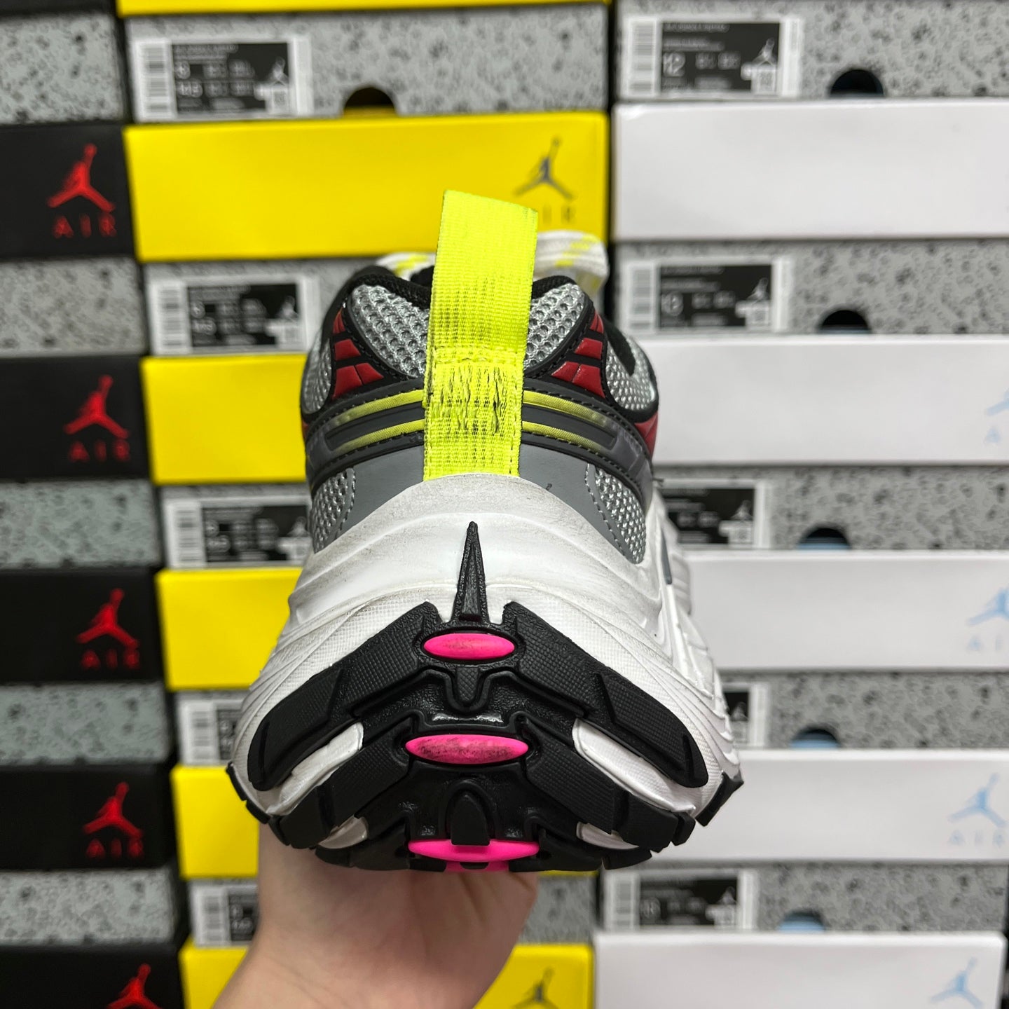 Balenciaga sneakers outsole, black tread with pink and white pods, chunky profile
