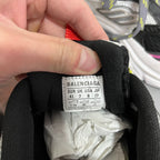 Black Balenciaga shoes with size label inside
