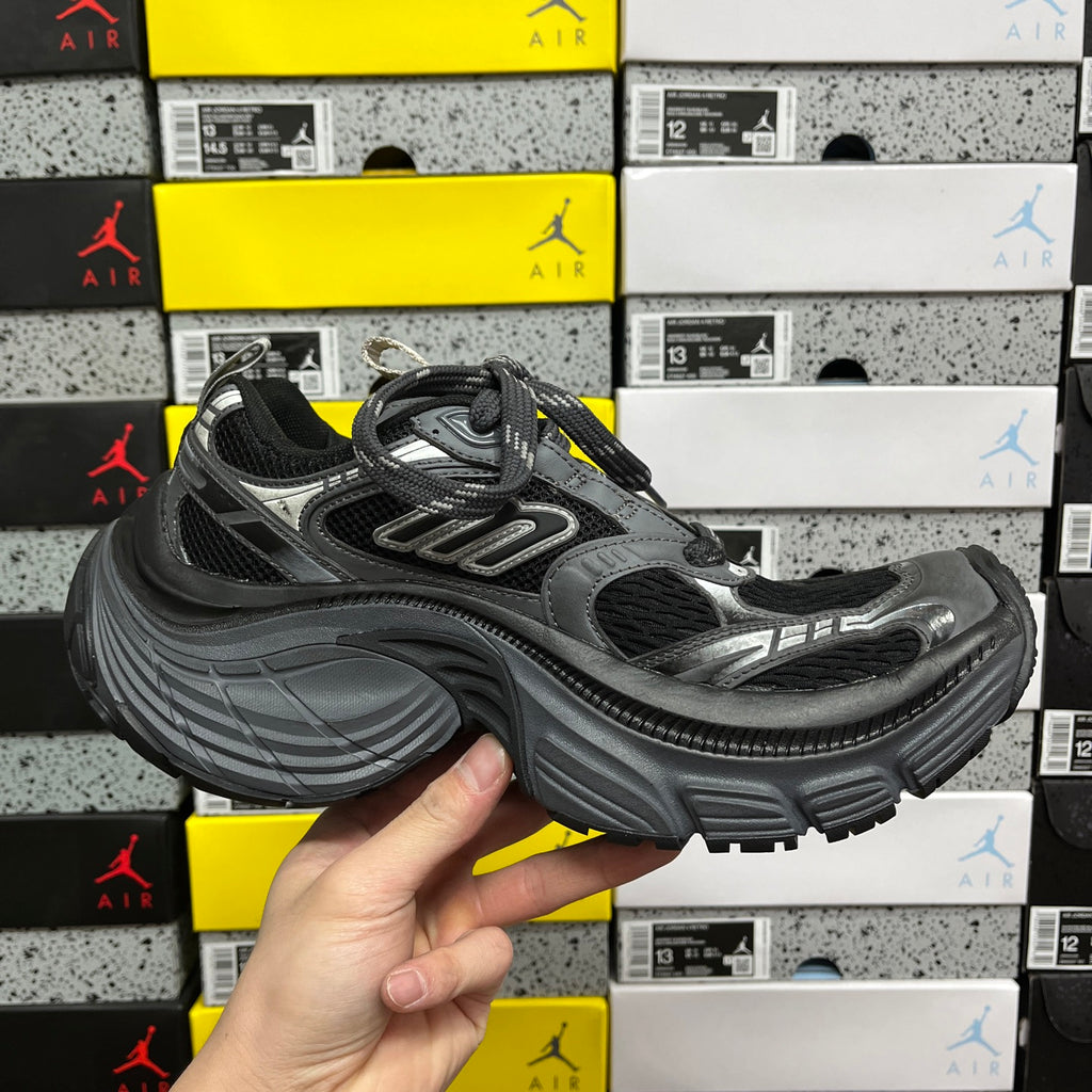 Balenciaga unisex chunky sneakers side view, dark gray mesh and glossy toe panel