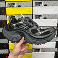 Balenciaga unisex chunky sneakers, dark gray with mesh panels and lace-up front