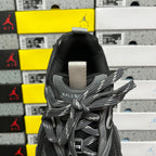 Balenciaga unisex sneaker tongue with BALENCIAGA logo label and gray lace ties, dark gray
