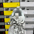 White Balenciaga sneaker back with fabric pull tab and lace-up vamp