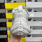 White sneaker heel outsole with molded traction pods and sculpted rubber tread