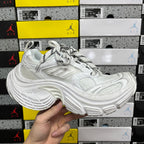 White Balenciaga lace-up dad sneaker with chunky sculpted sole and textured panels