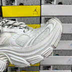 White Balenciaga sneaker side with embossed wave-like panels and ribbed midsole
