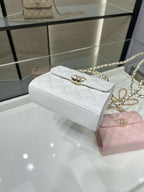 Chanel white quilted leather mini flap bag with gold chain strap and front clasp