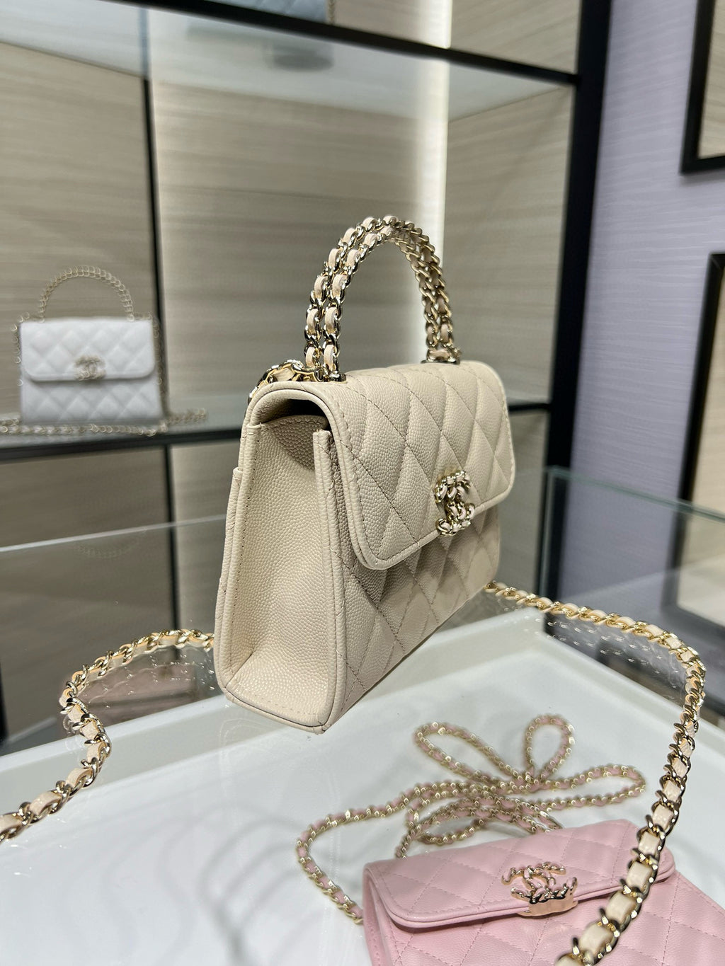 Chanel cream quilted small flap shoulder bag, gold chain strap, side view