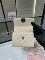 Chanel cream small flap shoulder bag with gold chain, quilted bottom detail